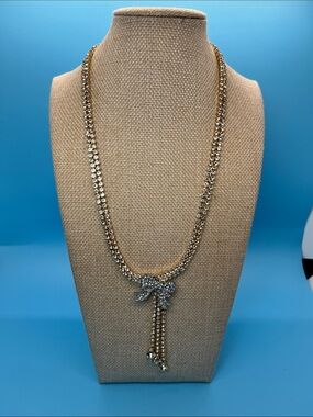 #0145. Macy's Gold-Tone Crystal Bow Lariat Necklace
